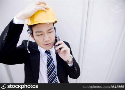Japanese office worker talking with a cellphone