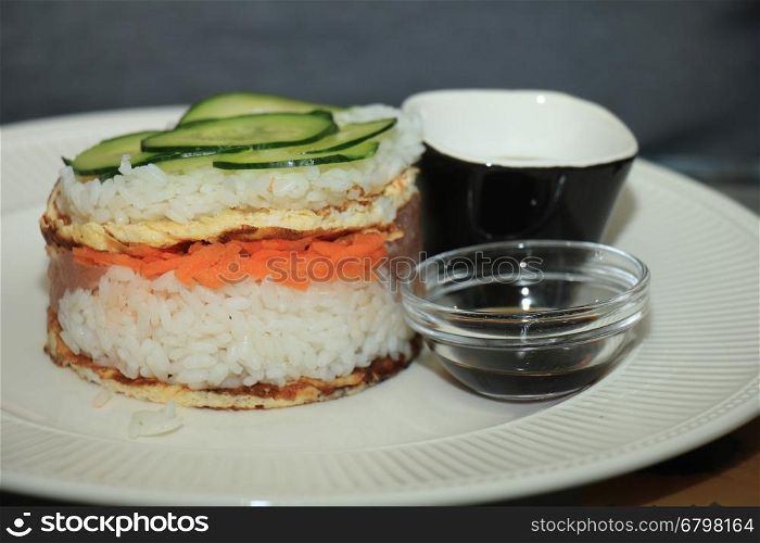 Japanese pressed sushi, Oshizushi with tuna fish, carrot and egg