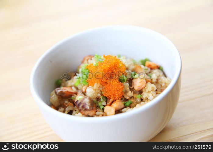 Japanese Salmon fried rice on wood background