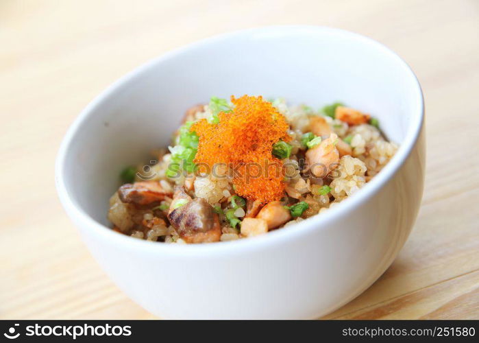 Japanese Salmon fried rice on wood background