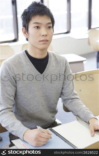 Japanese student studying in a classroom