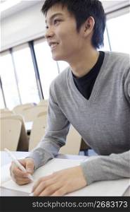 Japanese student studying in a classroom