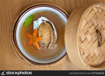 Japanese style abalone soup on bamboo bowl set holder