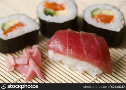 Japanese sushi. Japanese Cuisine, Sushi Set with red Tuna Nigiri, Maki Sushi and Sashimi