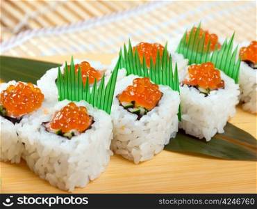 Japanese sushi .Roll made of Smoked fish and red roe