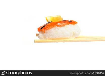 Japanese sushi rolls with wooden chopsticks isolated