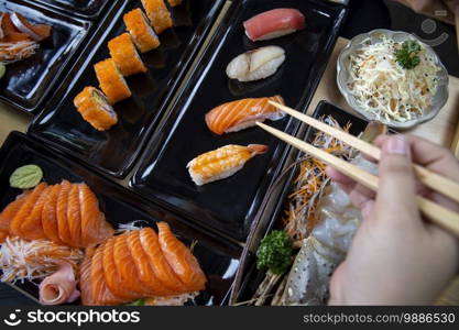 Japanese sushi set , Sushi nigiri rolls and sashimi served in japanese food restaurant menu