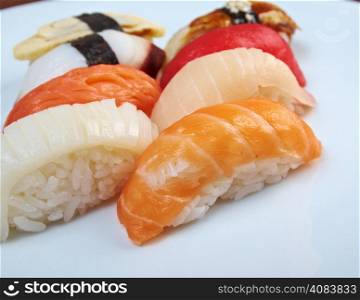Japanese sushi with rice and fish. Mix sushi