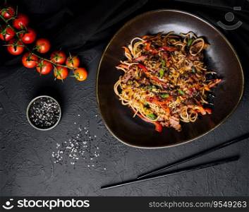 Japanese udon, soba with beef on black bowl