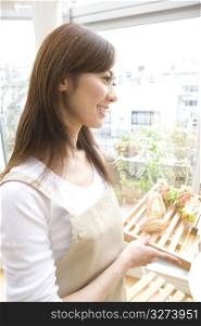 Japanese woman carrying a meal
