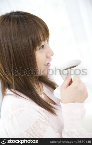 Japanese woman drinking coffee