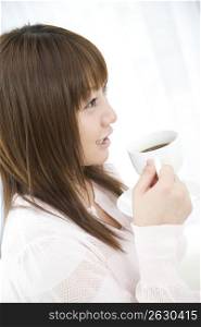 Japanese woman drinking coffee