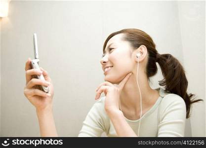 Japanese woman listening to the music