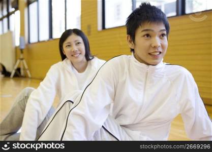 Japanese young couple doing a exercise