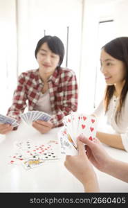 Japanese young playing a cards