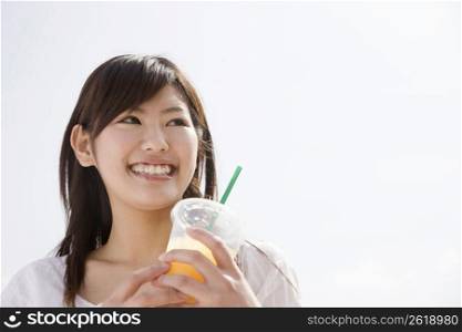Japanese young woman drinking coffee