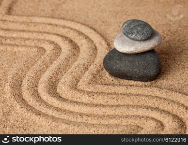 Japanese Zen stone garden - relaxation, meditation, simplicity and balance concept - pebbles and raked sand tranquil calm scene