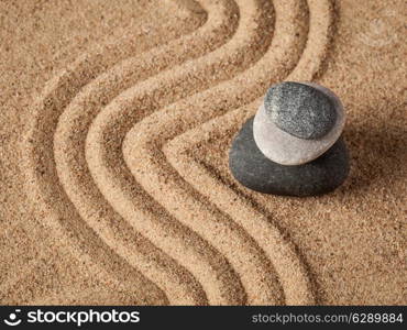 Japanese Zen stone garden - relaxation, meditation, simplicity and balance concept - pebbles and raked sand tranquil calm scene