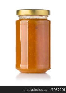 Jar of Apricot or peach jam isolated on white background with clipping path