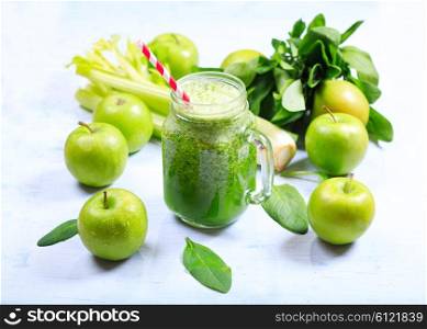 jar of green smoothie with apple, celery and spinach