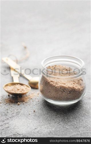 Jar of Hickory smoked  sea salt.  Healthy food concept. Speciality salt.