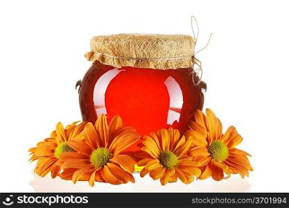 Jar of honey and flowers isolated over white