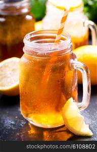 jar of lemon ice tea with striped straw