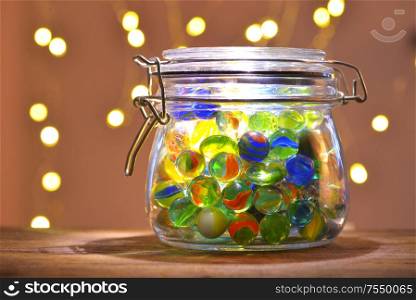 Jar of Marbles and Christmas festive lights