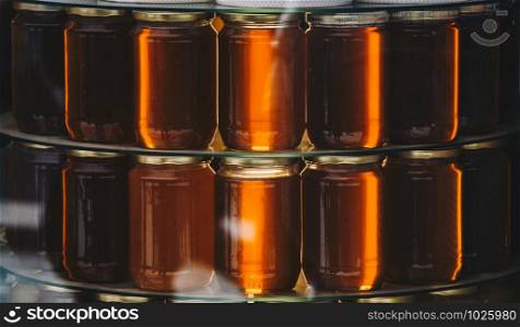 jars of fresh honey as delicious nutrient ingredient