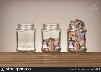 jars with different level of coins