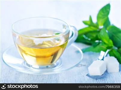 jasmin tea in glass cup and on a table