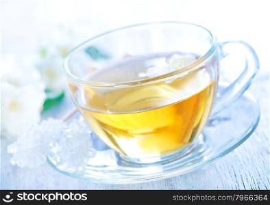 jasmin tea in glass cup and on a table