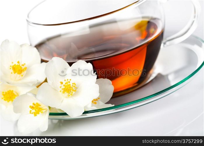 Jasmine tea with jasmine herb flower on white background