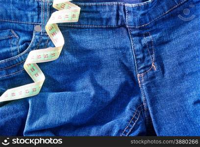 Jeans and green centimeter, jeans background, jeans texture
