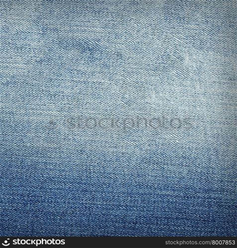 Jeans fabric as background. Texture of blue jeans fabric as background.