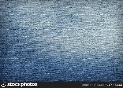Jeans fabric. Texture of blue jeans fabric as background.
