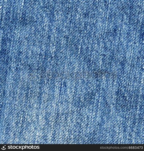 Jeans fabric. Texture of blue jeans fabric as background.
