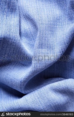 Jeans fabric with folds, may be used as background