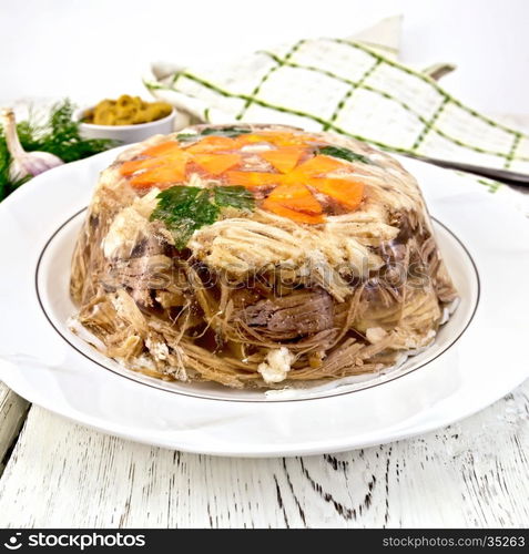 Jellied pork and beef with carrots and parsley on a plate, towel, garlic, mustard and dill on a wooden boards background