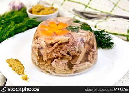 Jellied pork meat and beef, decorated with a flower from carrots and parsley on a plate with mustard and dill, dish towel on the background light wooden boards