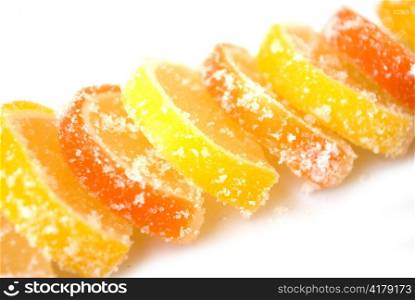 Jelly citrus candies orange and lemon isolated on white