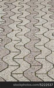 jerago street lombardy italy varese abstract pavement of a curch and marble