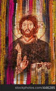 Jesus Christ image on bright vivid colourful yellow orange fabric texture background - Modren Jesus Christ religion artistic image
