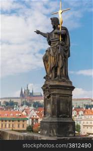 Jesus Christ statue on the Charles Bridge in Prague (Czech Republic)