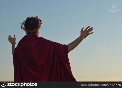 Jesus Christ with crown of thorns against the sky