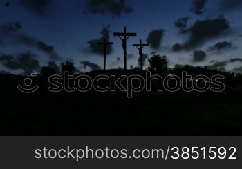 Jesus on Cross, meadow with olives, timelapse night to day, tilt