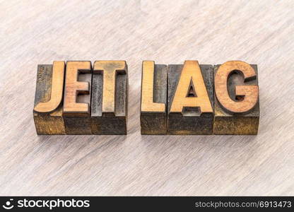 jet lag - word abstract in vintage letterpress wood type printing blocks