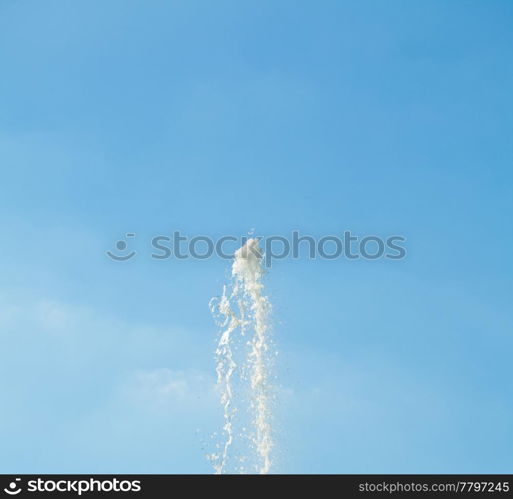 jet of water against the blue sky