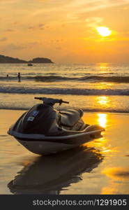 Jet ski at sunset on Patong beach, Phuket, Thailand