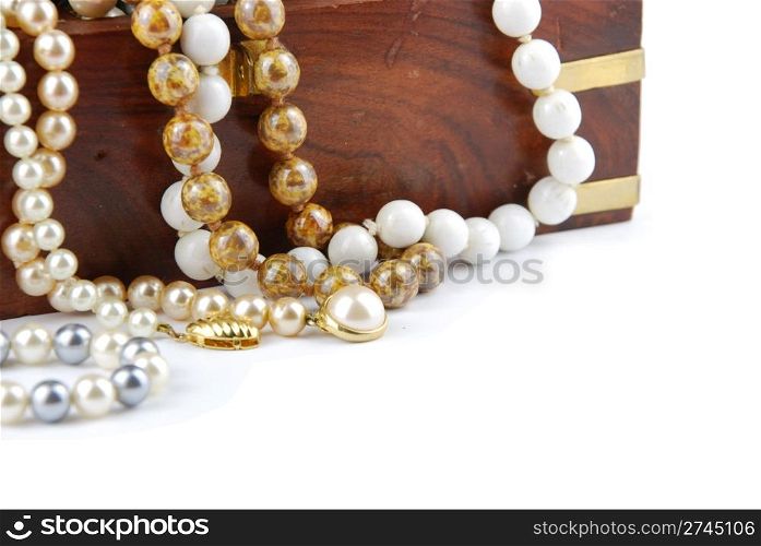 jewel box with pearl necklaces isolated on white background